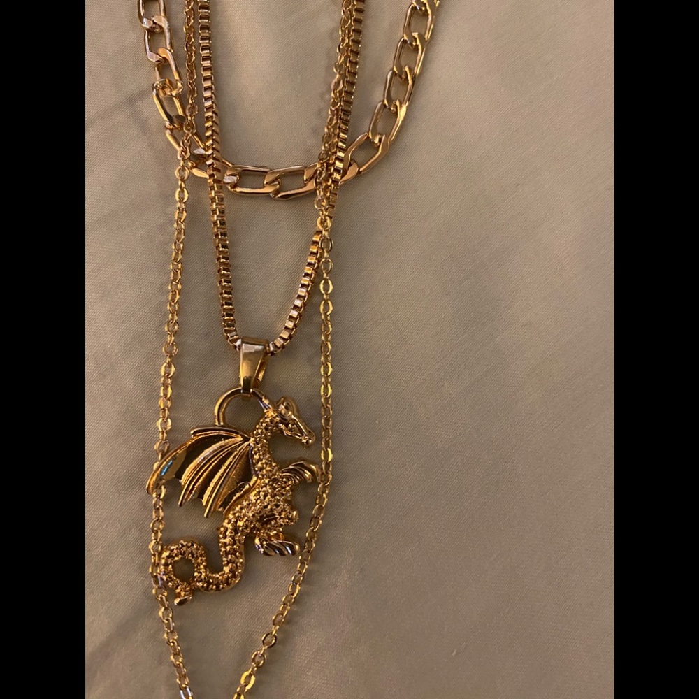 New layered gold colored winged dragon necklace